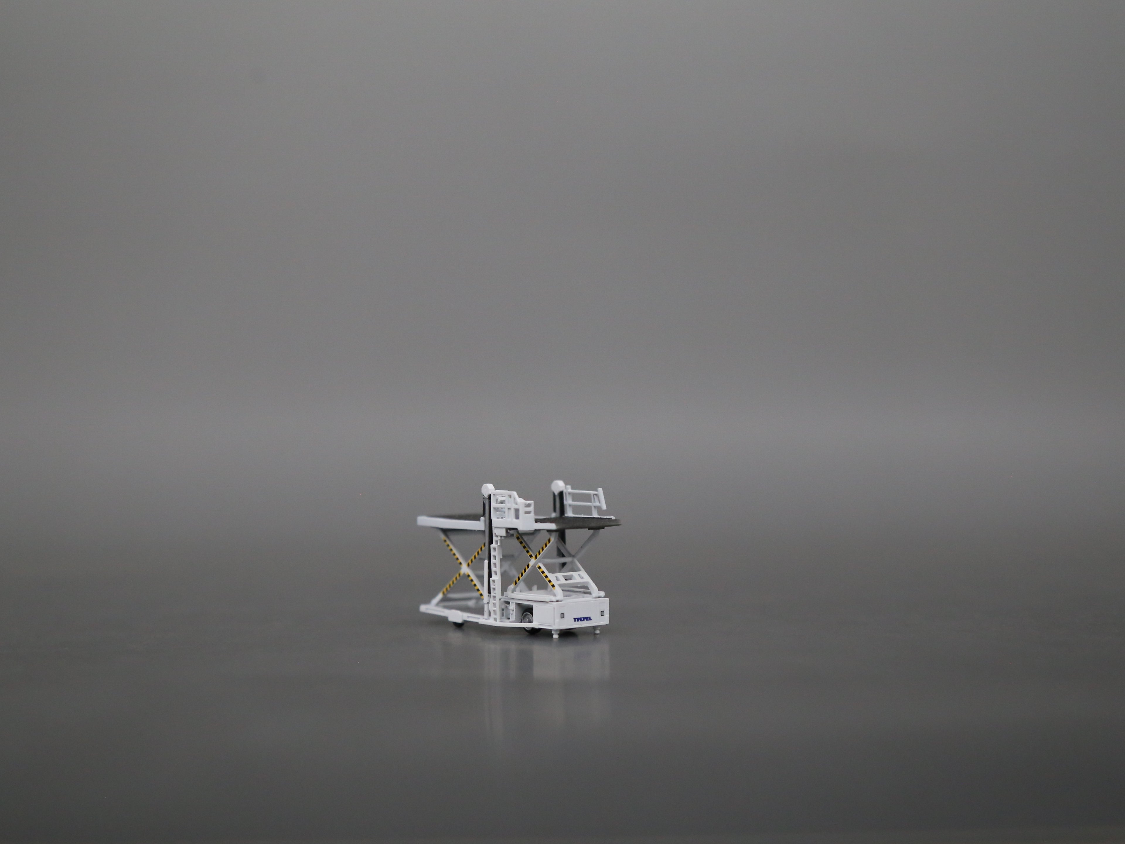 Scale 1:200/144 White trepel champ 70 airport cargo loader Finished Painted Printed 3D Model